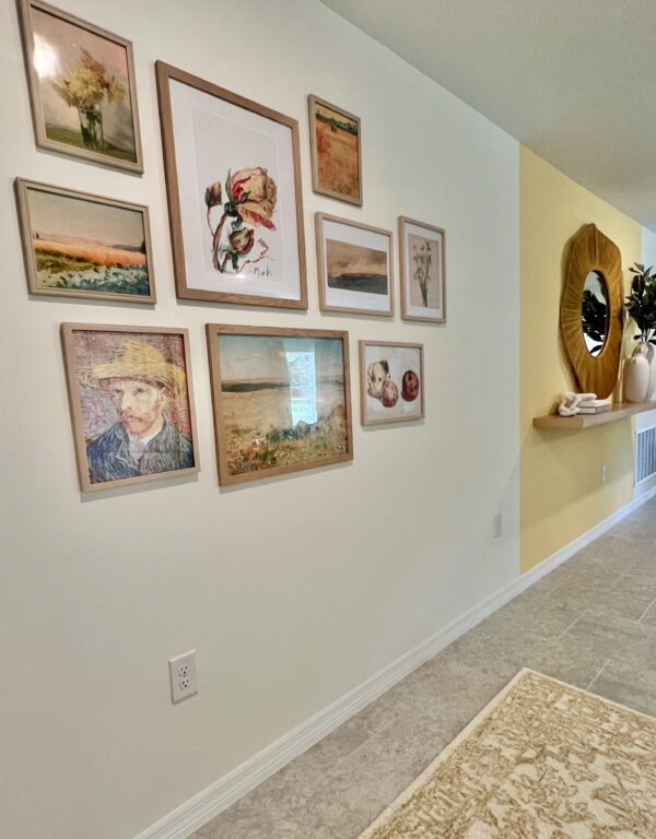Richmond Cove Palm Bay Holiday Builders Model Home wall display near entry