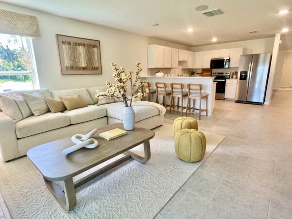 Richmond Cove Palm Bay Holiday Builders Model Home living room view of kitchen