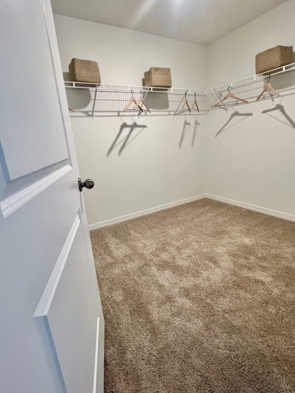 Richmond Cove Palm Bay Holiday Builders Model Home primary bedroom closet