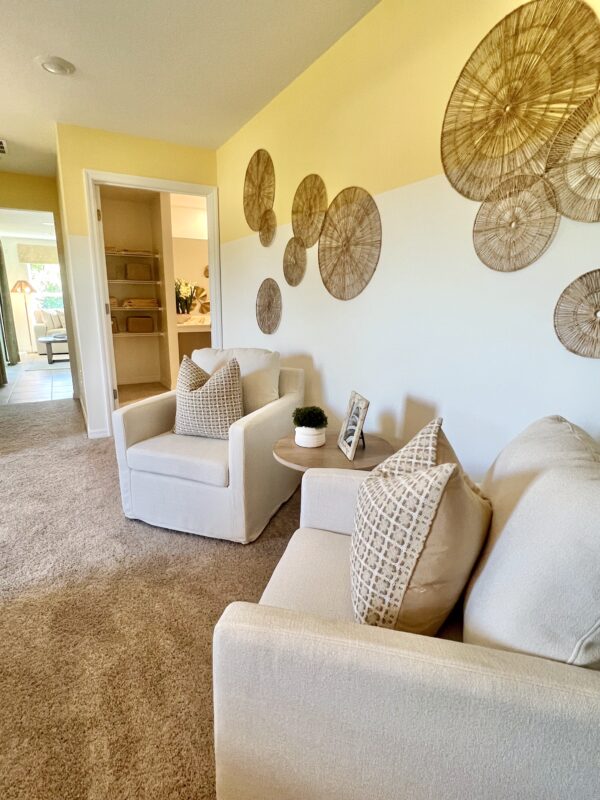 Richmond Cove Palm Bay Holiday Builders Model Home primary bedroom sitting area