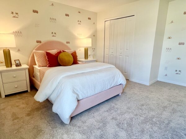 Richmond Cove Palm Bay Holiday Builders Model Home pink surf bedroom