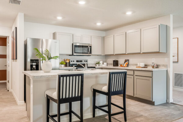 White kitchen view Holiday Builders model home