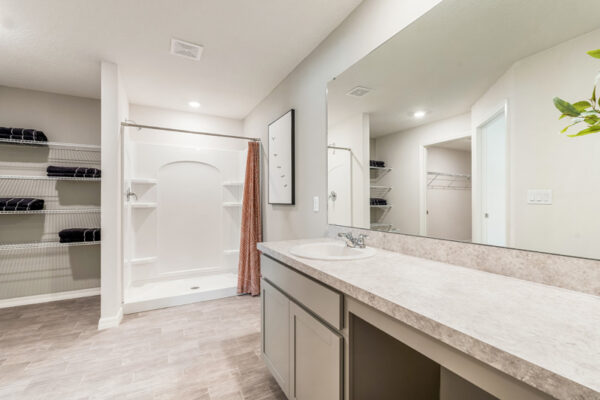 Bathroom view in a Holiday Builders model home