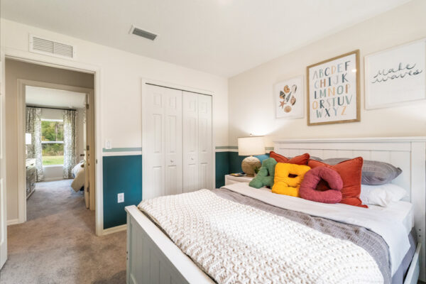 Flagler Estates in Hastings by Holiday Builders second bedroom view of hallway