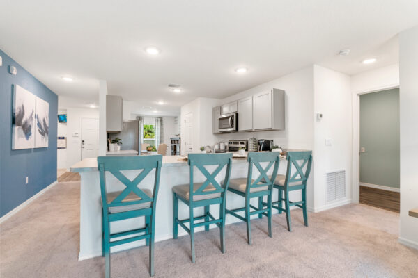The kitchen island of the Sylvester floorplan in the Value collection by Holiday Builders.