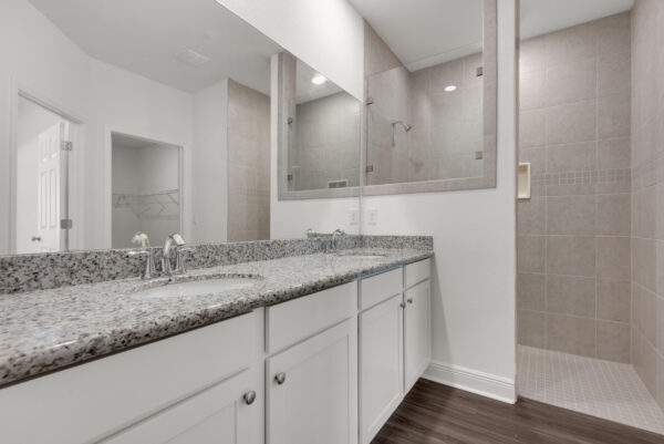 The master bathroom with walk-in shower in the Ariana floorplan from the Cornerstone collection by Holiday Builders.
