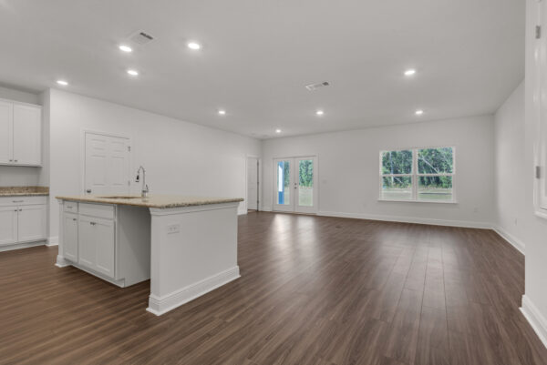 Hardwood flooring in the Ariana floorplan from the Cornerstone collection by Holiday Builders.