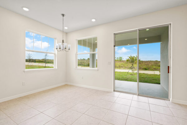 The dining room of the Biscayne floorplan of the Cornerstone Collection in Eden Hills