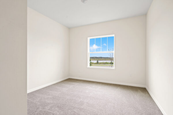 The guest bedroom of the Biscayne floorplan of the Cornerstone Collection in Eden Hills