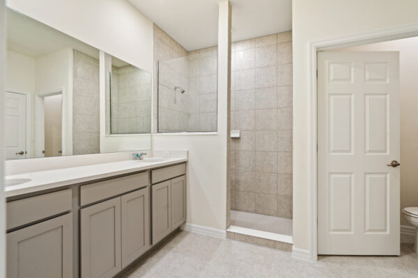 The owners bath of the Biscayne floorplan of the Cornerstone Collection in Eden Hills