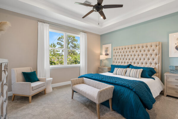 The master bedroom in the Charlotte floorplan from the Cornerstone collection by Holiday Builders.