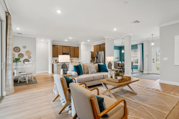 The open concept living area in the Charlotte floorplan from the Cornerstone collection by Holiday Builders.