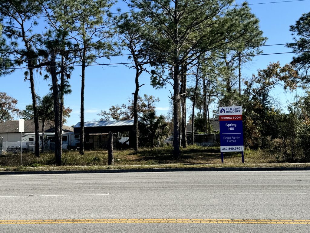 .Holiday Builders Coming Soon Sign