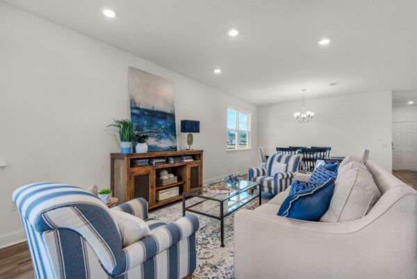 The living and dining areas in the Cypress floorplan from the Cornerstone collection by Holiday Builders.
