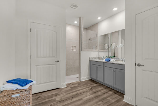 The master bath in the Cypress floorplan from the Cornerstone collection by Holiday Builders.