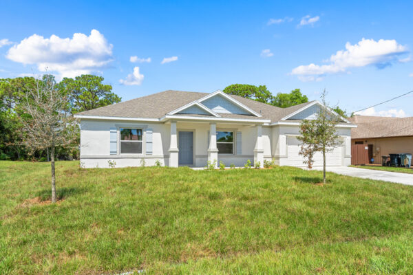 The exterior of the Delray floorplan from the Cornerstone collection by Holiday Builders.
