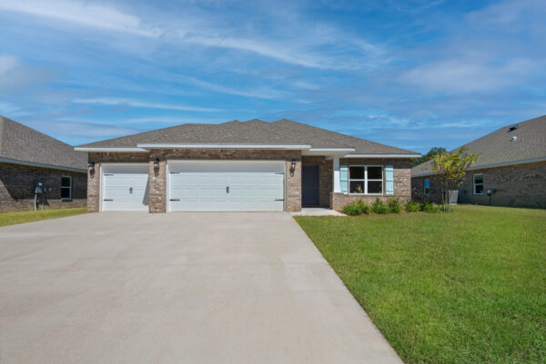 The exterior of the Destin floorplan from the Cornerstone collection by Holiday Builders.