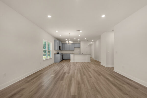 The open concept Destin floorplan from the Cornerstone collection by Holiday Builders.