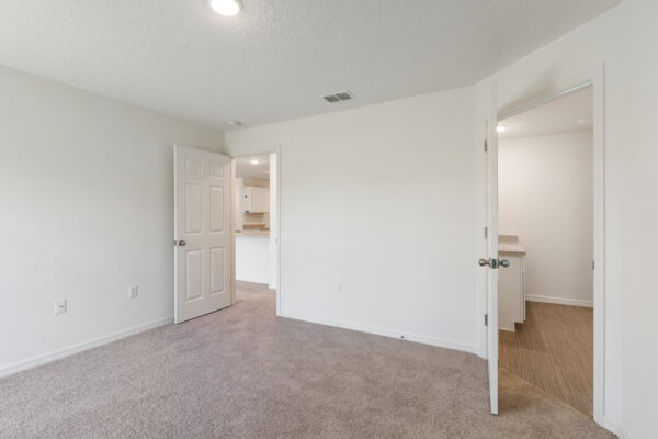 The master bedroom in the Foxtail floorplan from the Value collection by Holiday Builders.