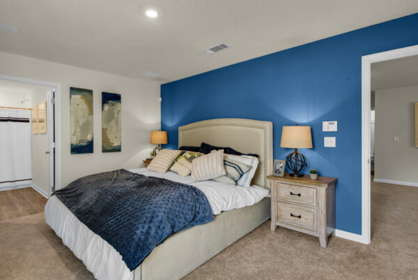 The master bedroom in the Grayton floorplan from the Value collection by Holiday Builders.