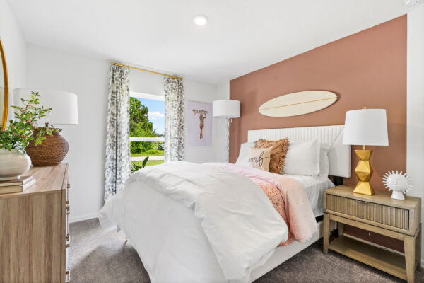 The guest bedroom of the Palm floorplan from the Inspire Collection