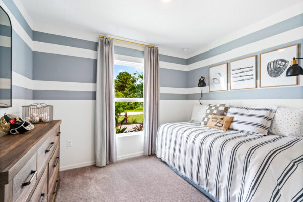 The guest bed of the Palm floorplan from the Inspire Collection