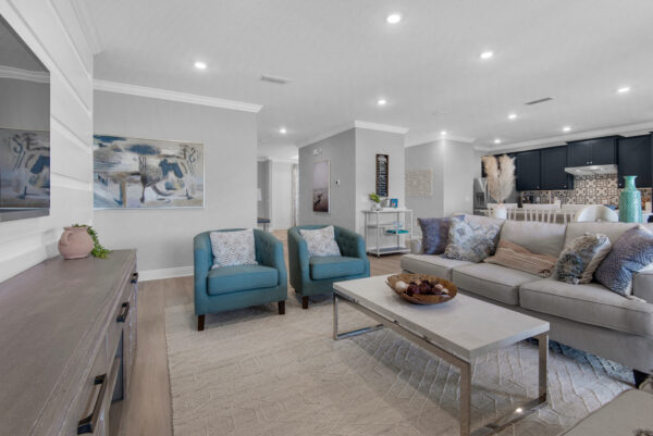 The living area in the Hamilton floorplan from the Cornerstone collection by Holiday Builders.