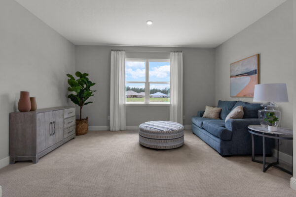 The master sitting area in the Hamilton floorplan from the Cornerstone collection by Holiday Builders.