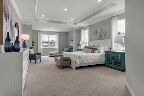 The large master suite in the Hamilton floorplan from the Cornerstone collection by Holiday Builders.