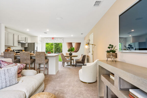 The living to kitchen view of the Palm floorplan from the Inspire Collection