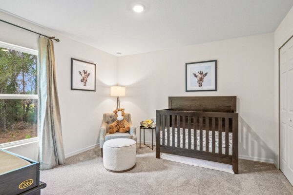 A baby's room in the Majestic floorplan from the Value Collection