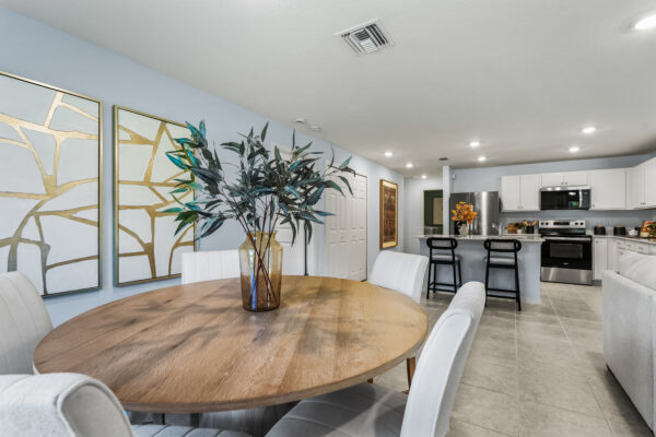 The dining area of the Majestic floorplan from the Holiday Builders Value Collection