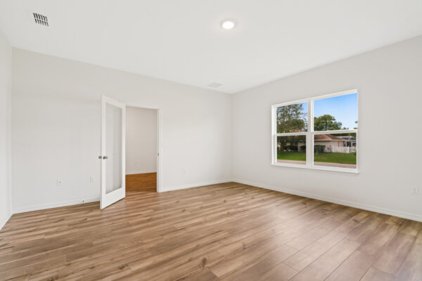 The dining room in the Naples floorplan from the Cornerstone collection by Holiday Builders.