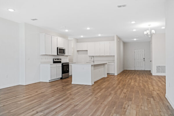 The entryway of the Naples floorplan from the Cornerstone collection by Holiday Builders.