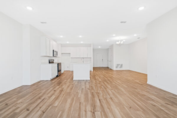 The open concept Naples floorplan from the Cornerstone collection by Holiday Builders.