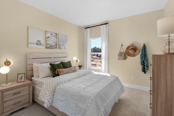 Another guest bedroom in the Navarre floorplan from the Cornerstone collection by Holiday Builders.