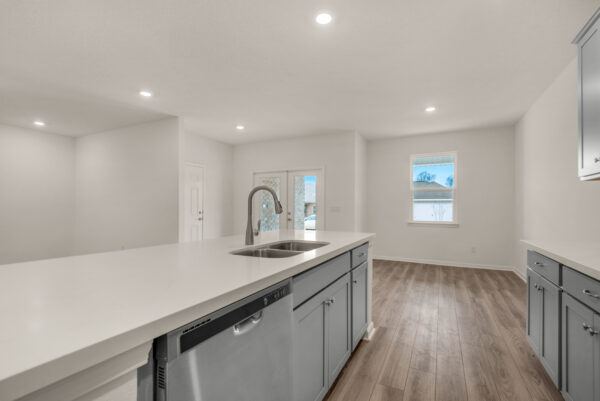 The dining area in the Osprey floorplan from the Cornerstone collection by Holiday Builders.