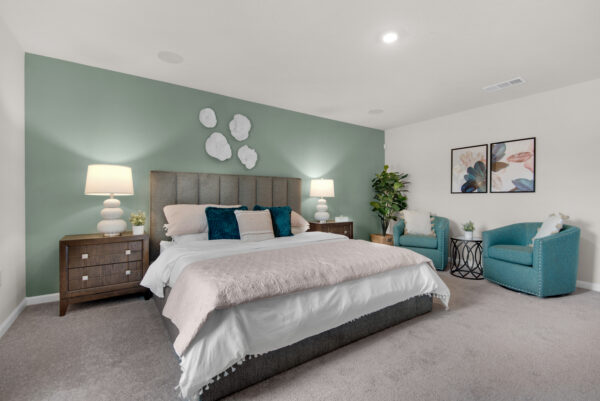 The master bedroom in the Palmer floorplan from the Value collection by Holiday Builders.