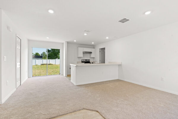 The open layout in the Phoenix floorplan from the Inspire Collection by Holiday Builders.