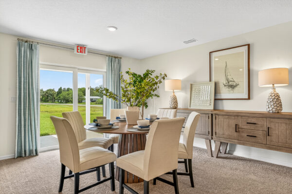 The dining room in the Queen floorplan from the Value Collection by Holiday Builders