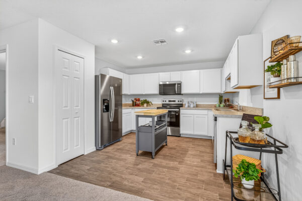 The kitchen in the Queen floorplan from the Value Collection by Holiday Builders