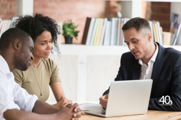 Real estate agent with homebuyers