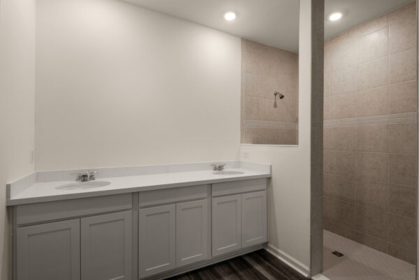 The master bath in the Rosemary floorplan from the Cornerstone collection by Holiday Builders.