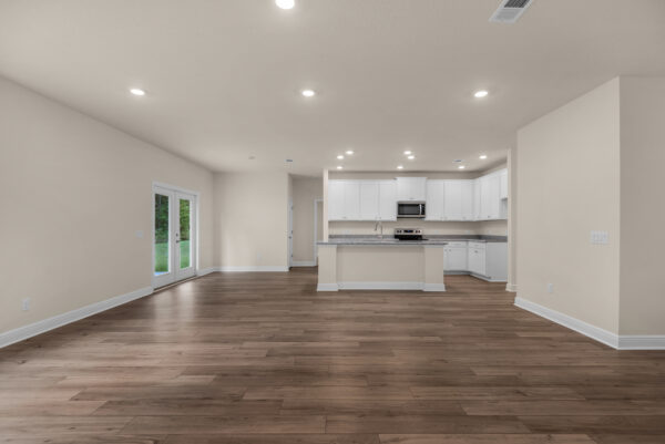 The open layout in the Rosemary floorplan from the Cornerstone Collection by Holiday Builders.