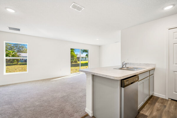 The living area view in the Sago floorplan from the Value collection by Holiday Builders.