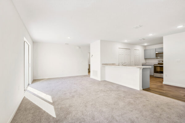 The open living area in the Sago floorplan from the Value collection by Holiday Builders.