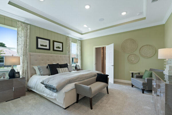 The master bedroom in the Sanibel floorplan from the Cornerstone collection by Holiday Builders.