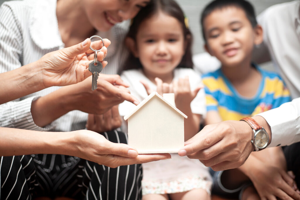 Family with a house cut out