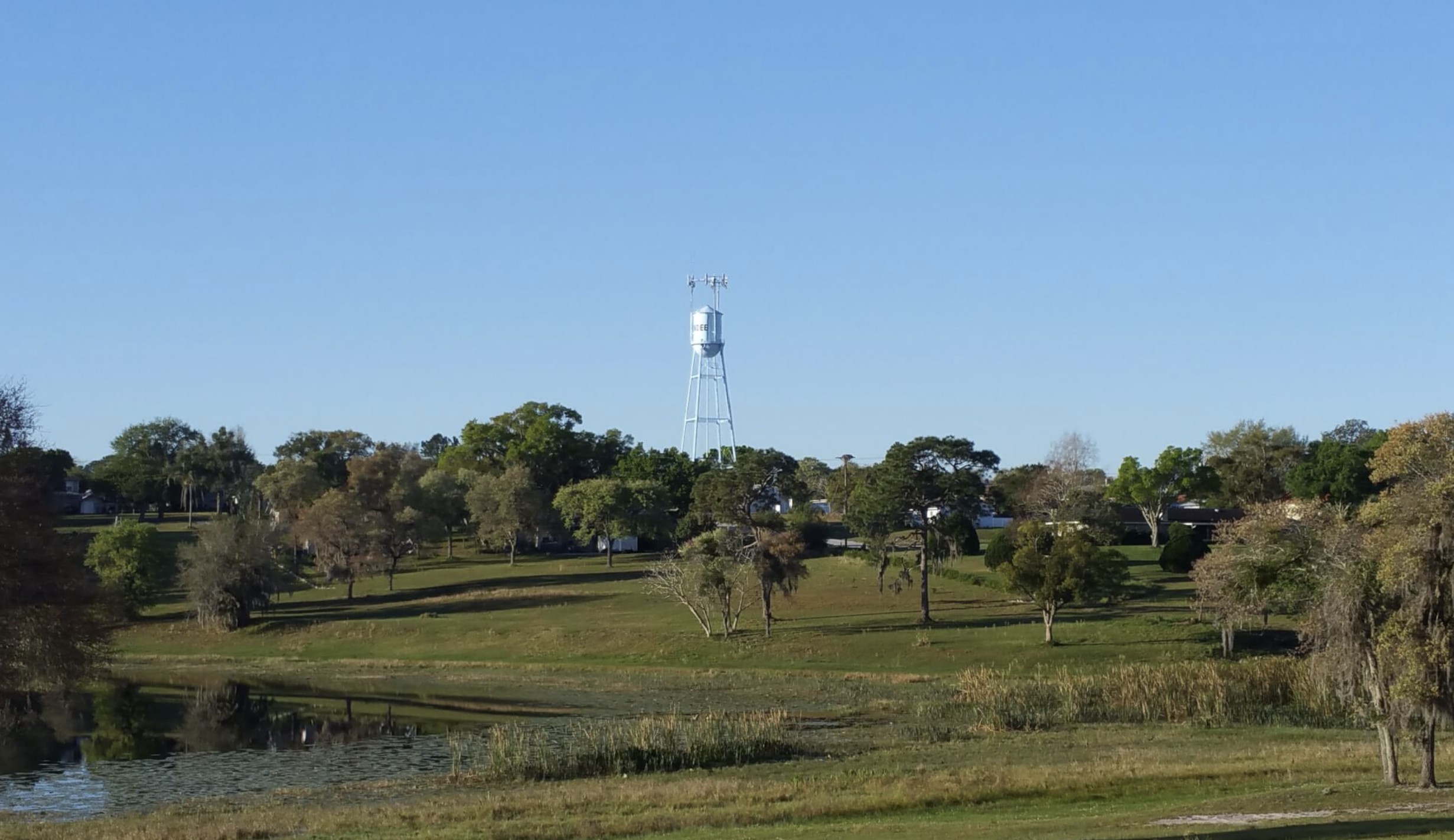 Water tower in field