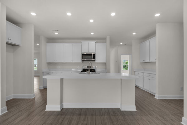 The kitchen in the Walton floorplan from the Cornerstone Collection by Holiday Builders.